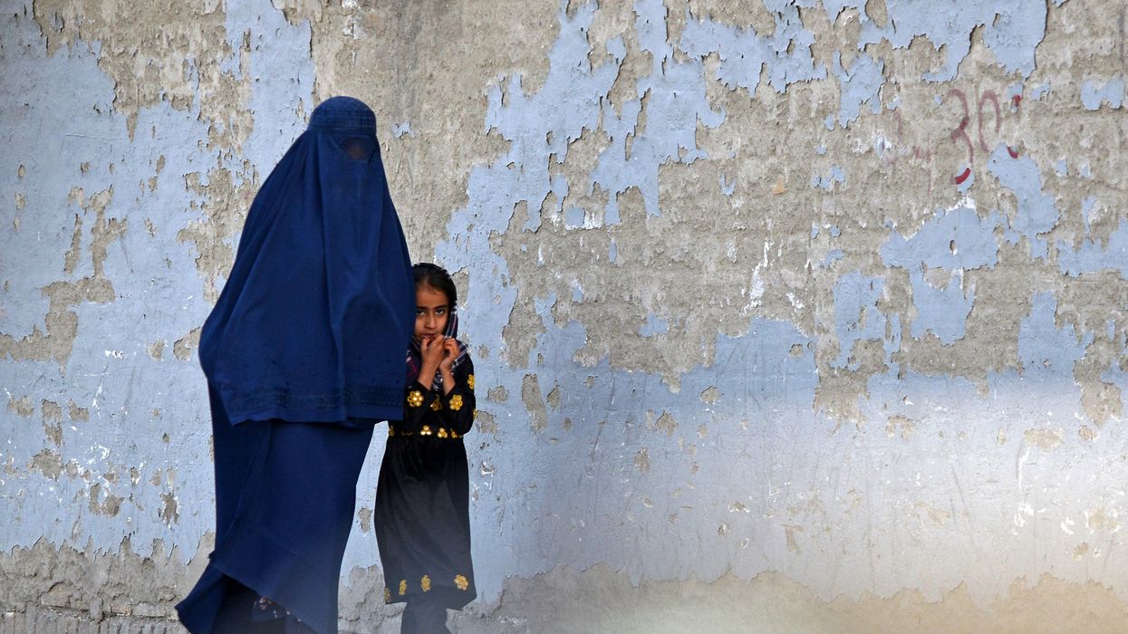 Afghan woman and girl