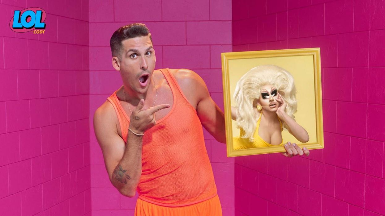 Cody Rigsby of LOL Cody holds framed portrait of drag queen Trixie Mattel