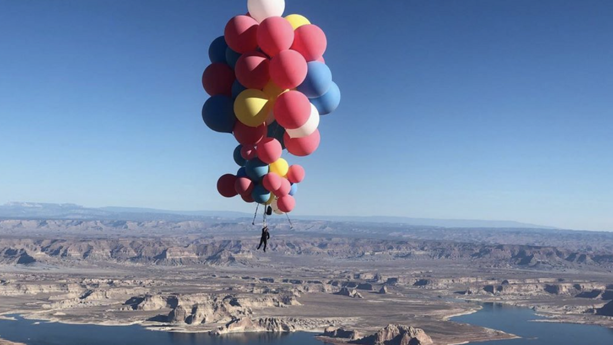 David Blaine Uses Helium Balloons To Fly Over Arizona Desert In 'Ascension'