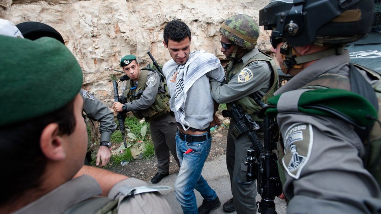 Israeli forces arrest a Palestinian activist
