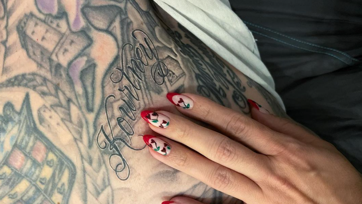 Travis Barker Tattoos Kourtney Kardashian's Name on His Chest
