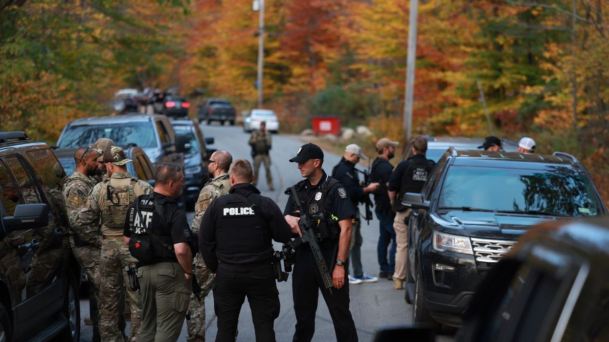 Police gather for manhunt of Maine shooting suspect Robert Card