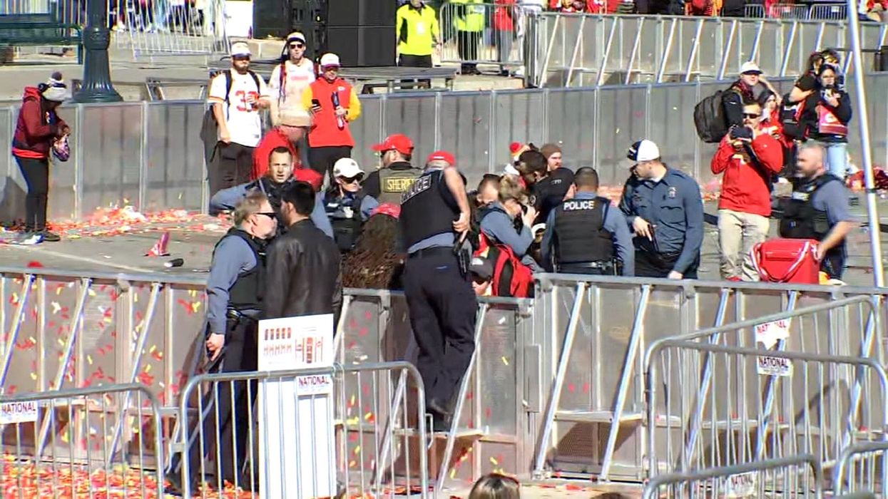Police respond to the scene of a shooting at the Kansas City Chiefs' Super Bowl parade.