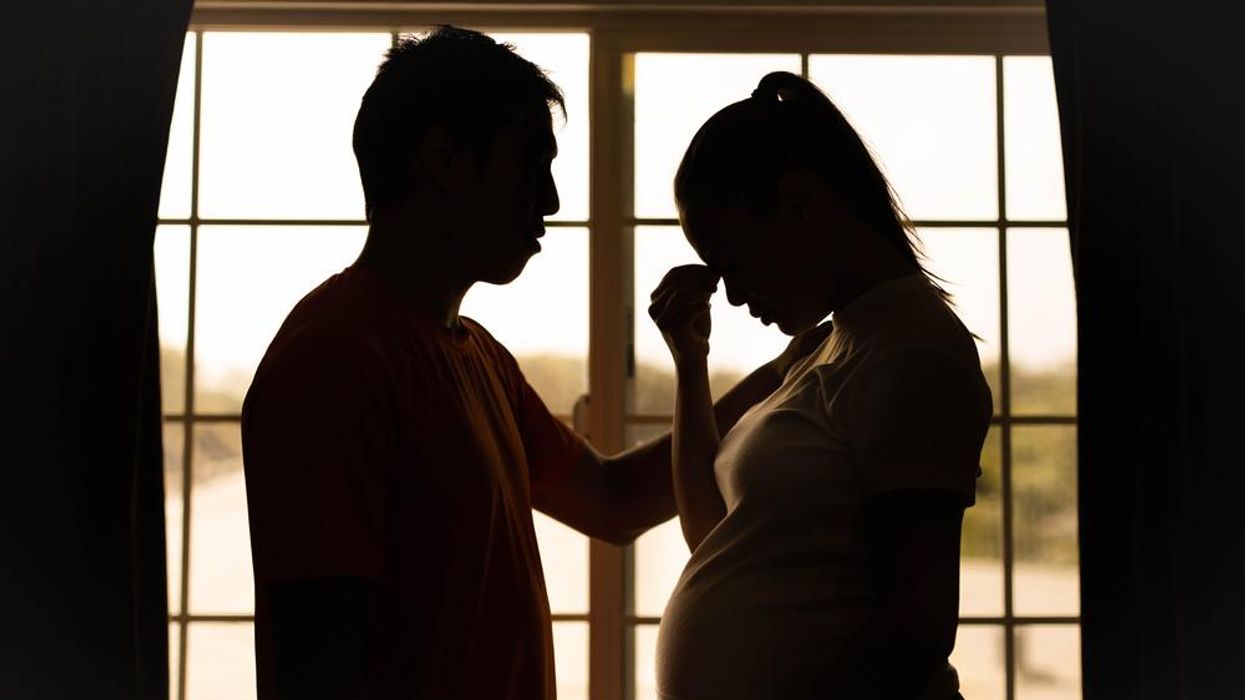 Pregnant woman and partner