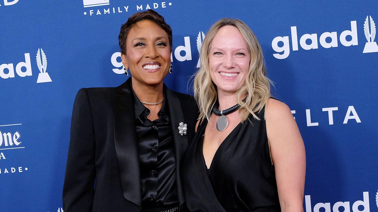 Robin Roberts and her partner on carpet