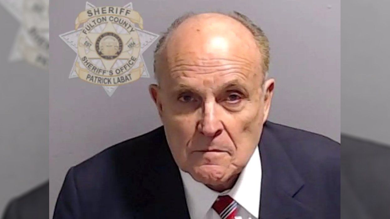 Rudy Giuliani Turns Himself In, Poses For Mugshot