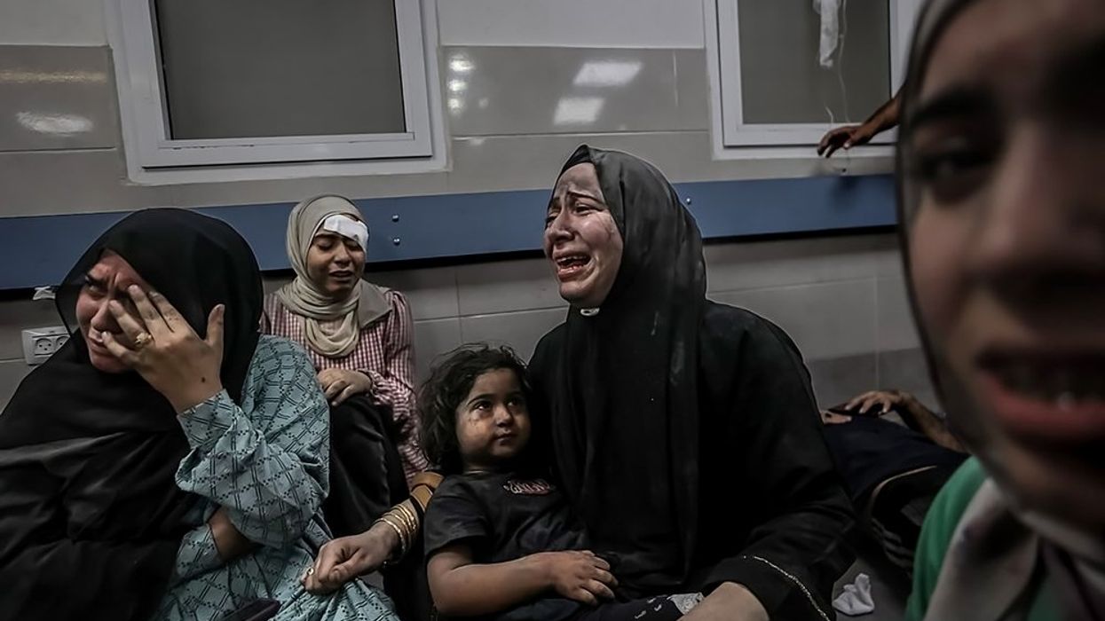Women at Gaza hospital crying