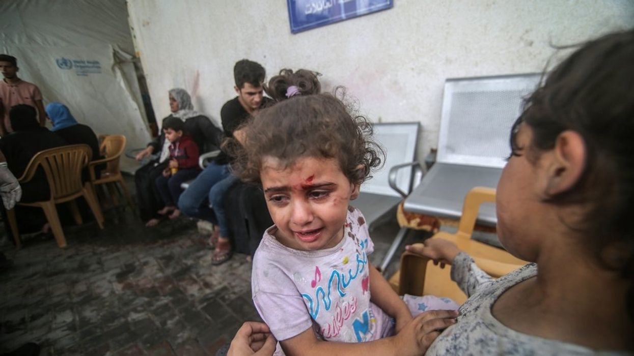 Young wounded  Palestinian girl crying